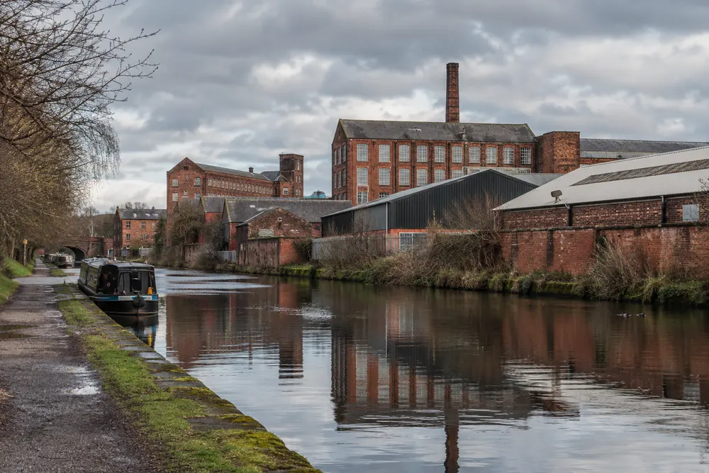 Canal and red-brick industrial buildings in a northern English setting